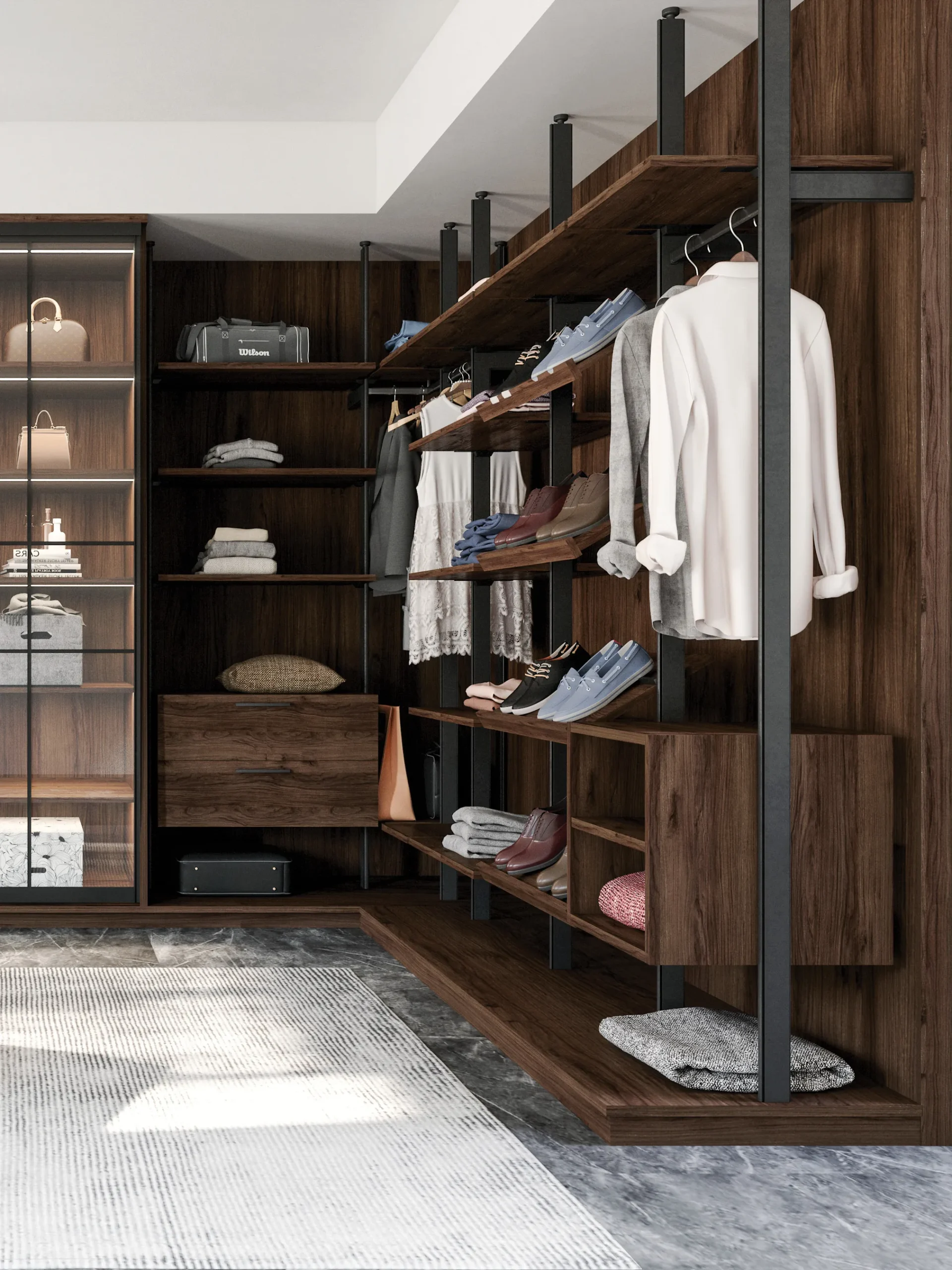 Vue en perspective d’un dressing ouvert sur mesure avec structure noire, étagères bois foncé, penderies, tiroirs et présentation soignée des vêtements et chaussures.